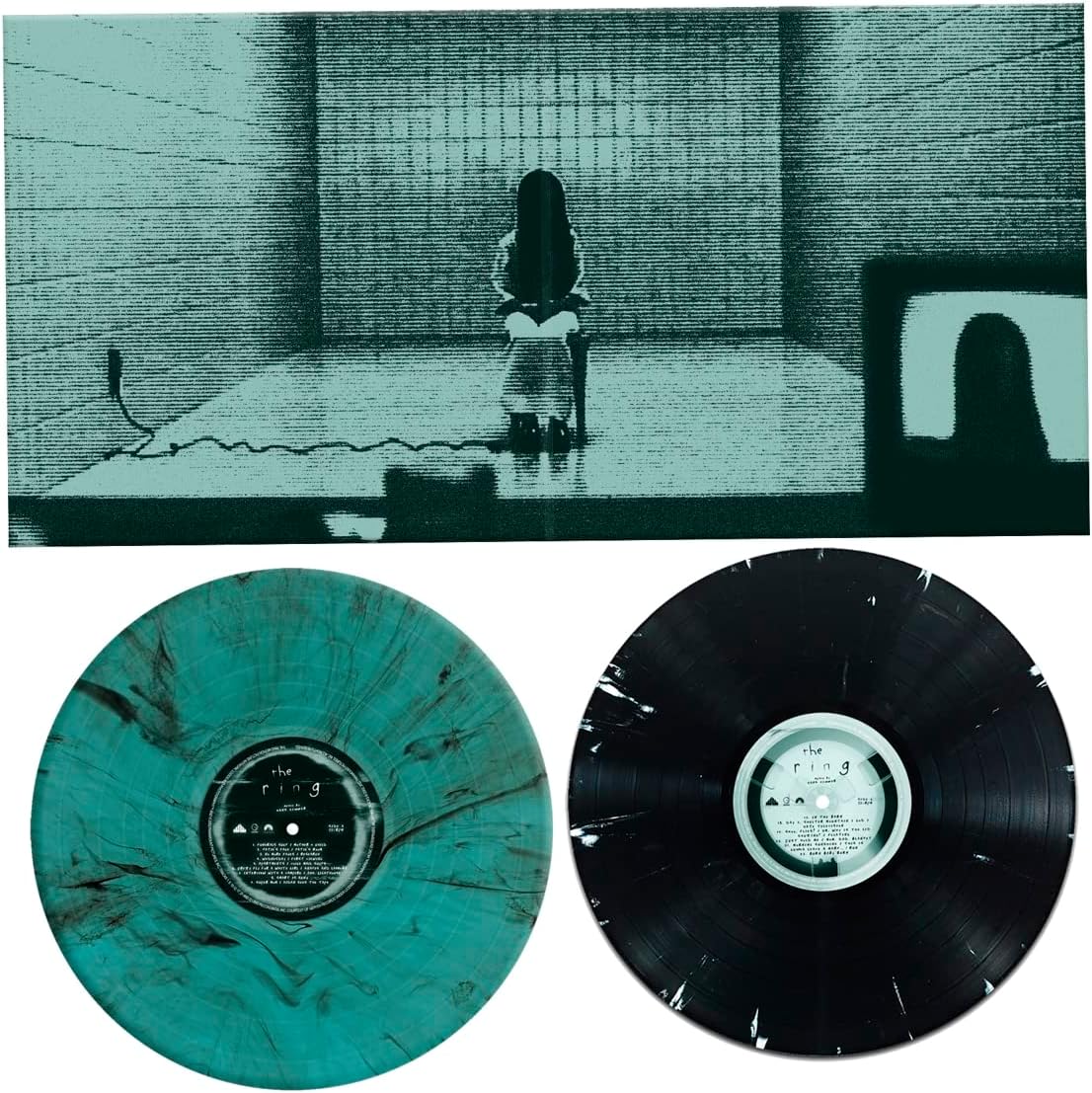 Two teal vinyl LPs with a ghostly figure on the cover art.
