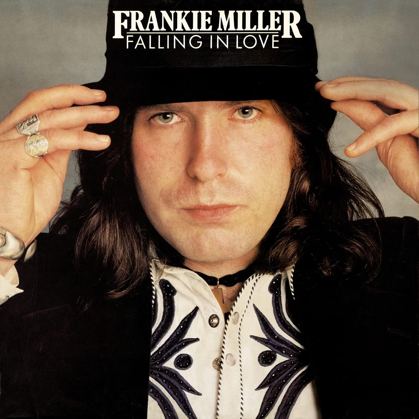 Frankie Miller album cover featuring a portrait of the singer in a hat.