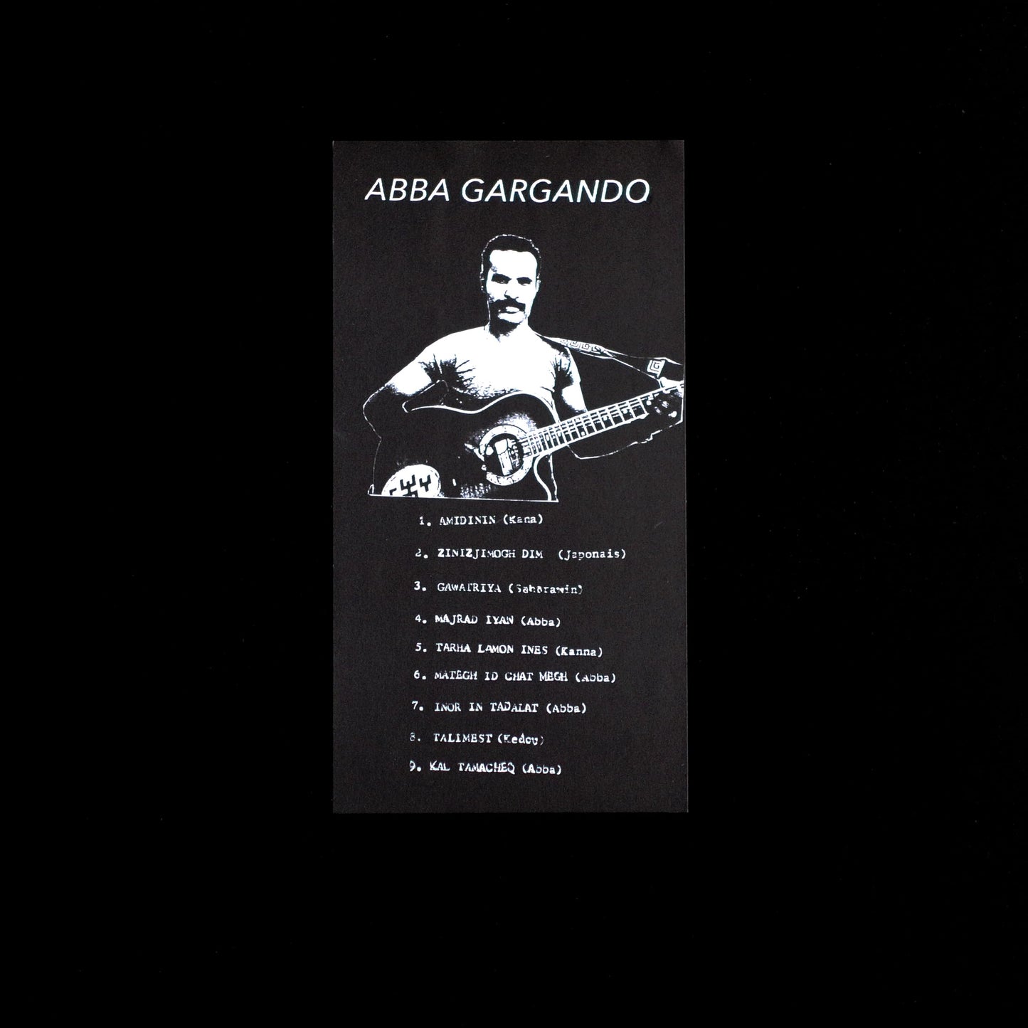 Vinyl record cover for "Gargando, Abba" featuring a man with a guitar.