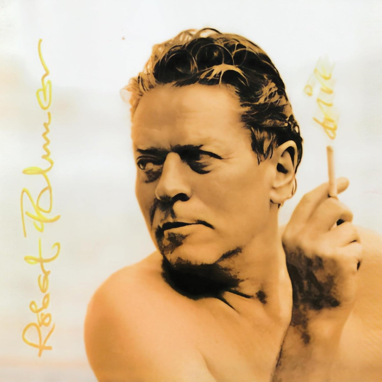 Robert Palmer's "Drive" CD cover featuring a portrait of the singer.