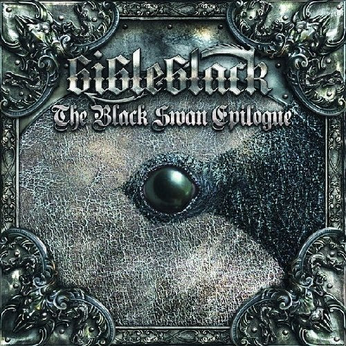 CD cover with ornate silver frame and a swan’s eye.