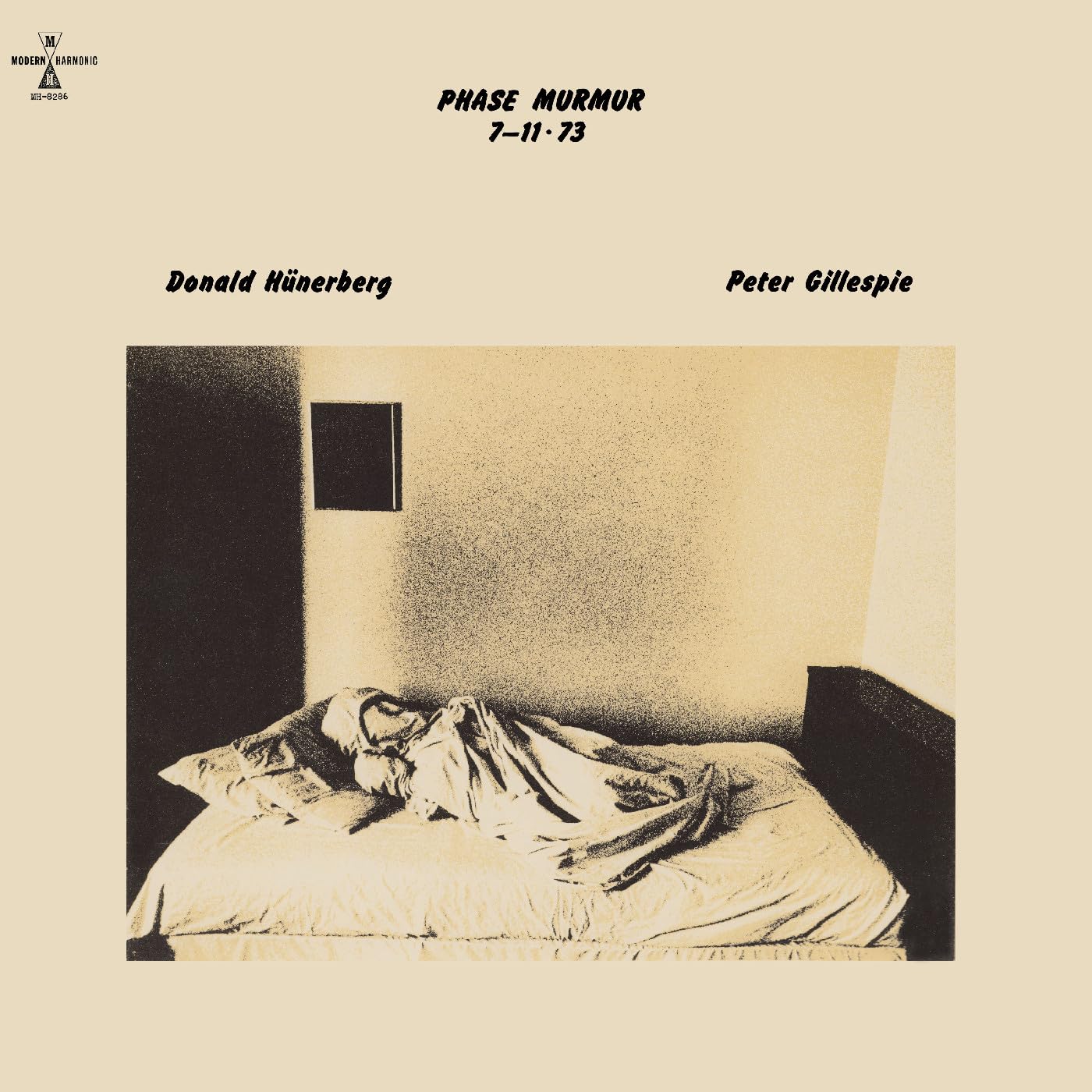 CD album cover: a person in bed, sepia toned, with text.