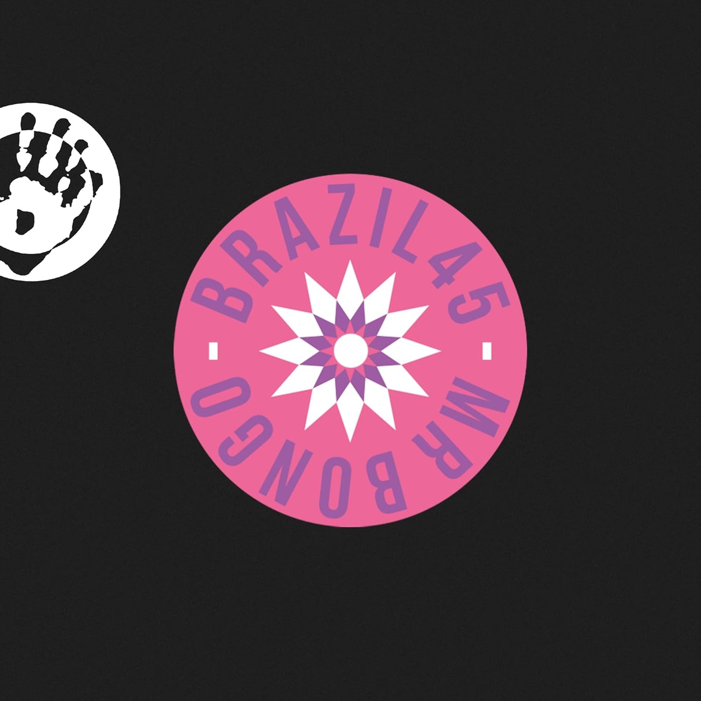 Vinyl record label with a hand and starburst design on black.