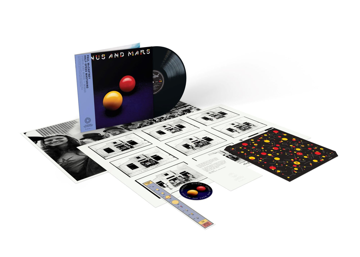 Venus and Mars" vinyl record by Paul McCartney & Wings, with artwork and inserts.