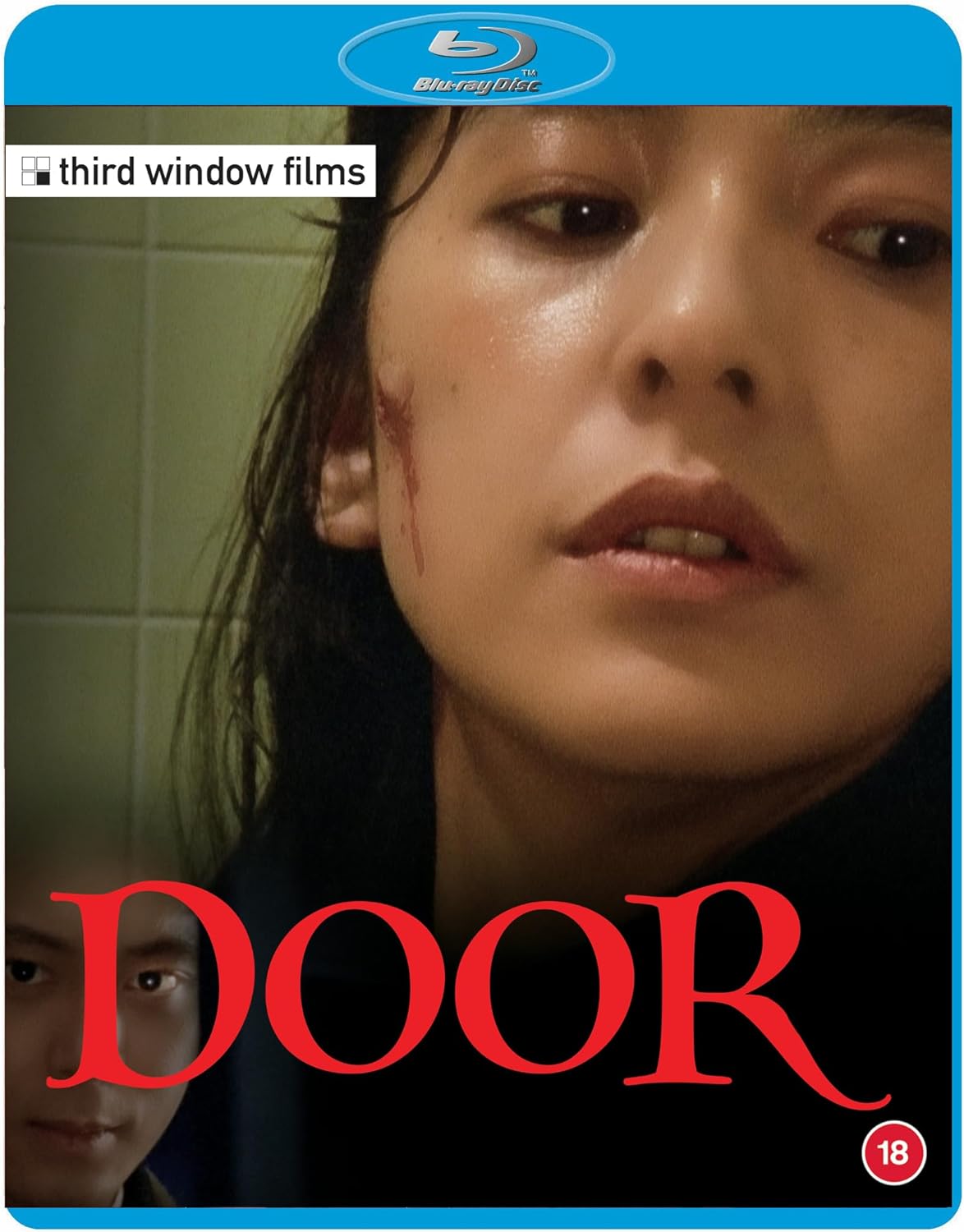 Blu-ray cover for "Door" featuring a woman with a facial injury.