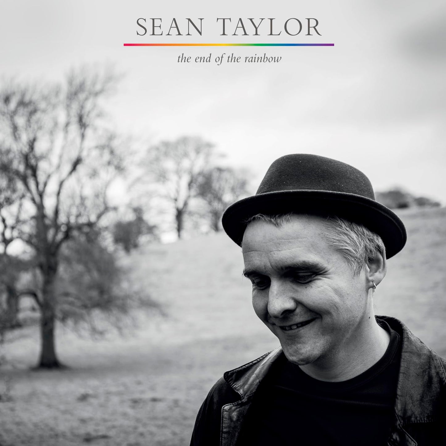 Black and white album cover featuring Sean Taylor with a hat.