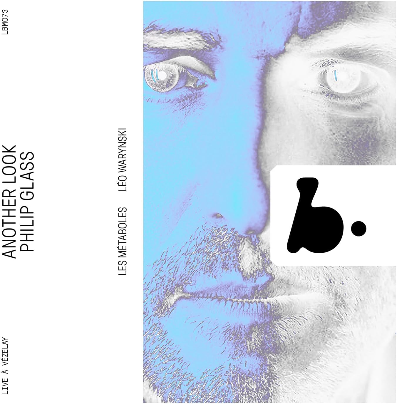 CD cover with a close-up of an eye and abstract black shape.