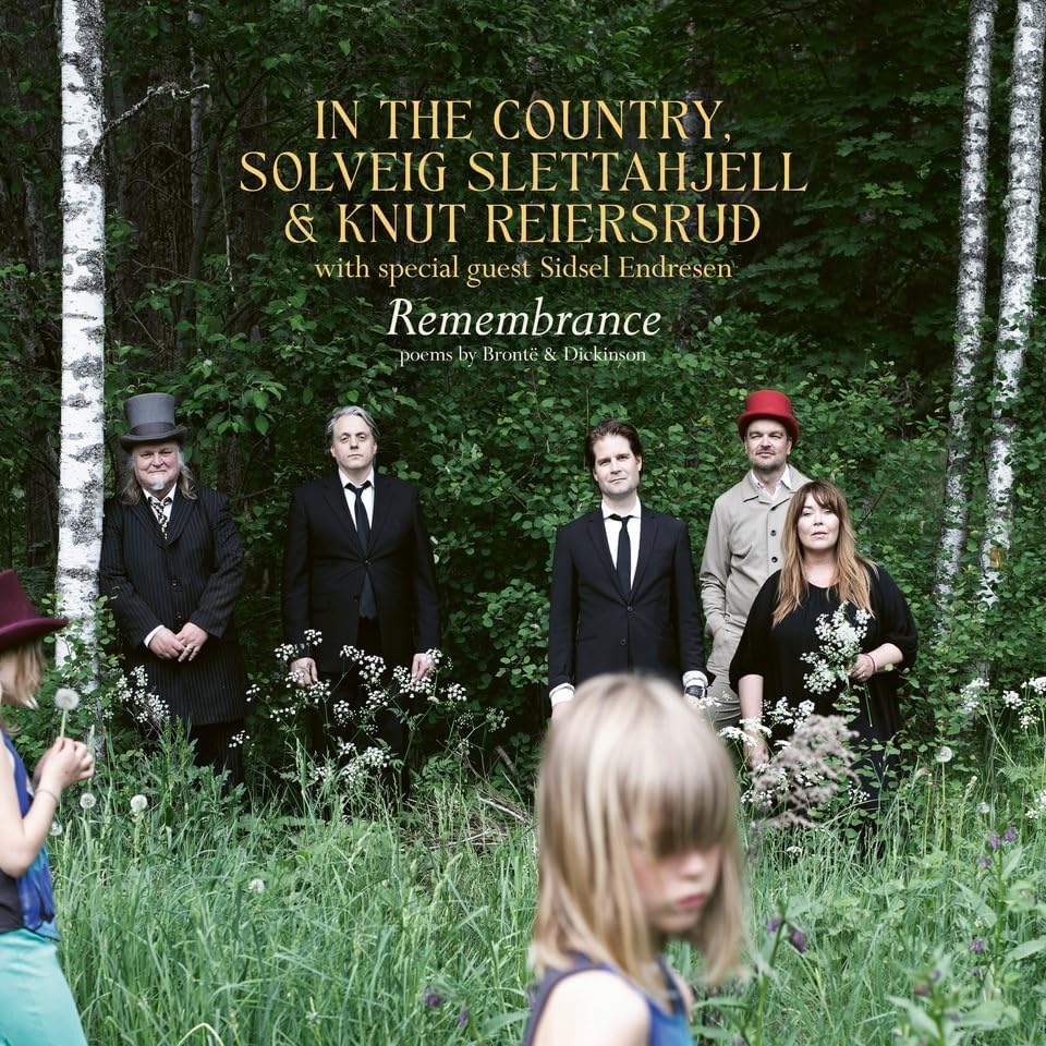 Album cover for "Remembrance" by Solveig Sletta, featuring four people in a forest.