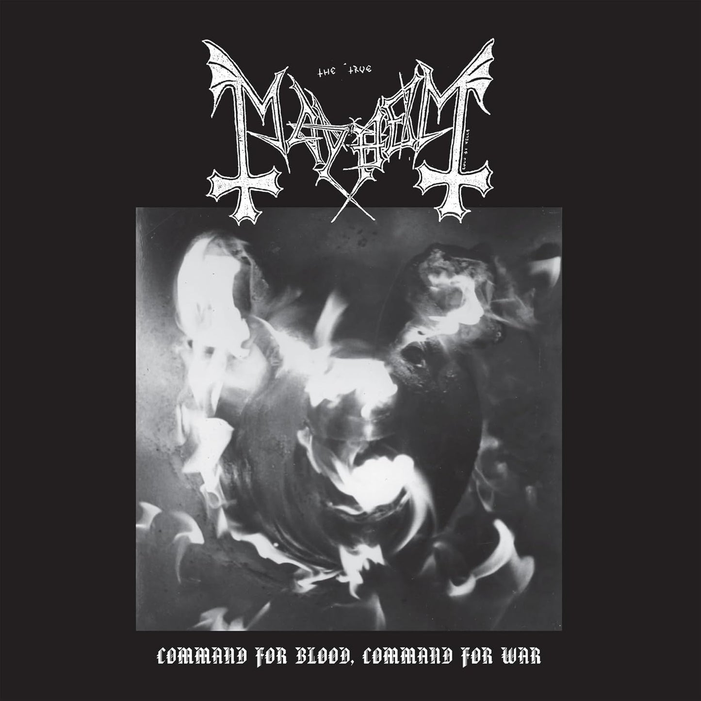 Black and white album cover with band logo and fiery imagery.