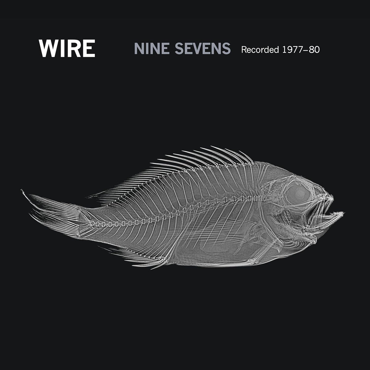 Wire’s “Nine X Seven” CD cover: a skeletal fish on black background.