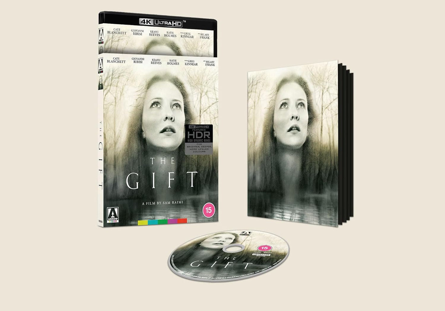 The Gift 4K Ultra HD Blu-ray case, booklet, and disc with ghostly portrait art.