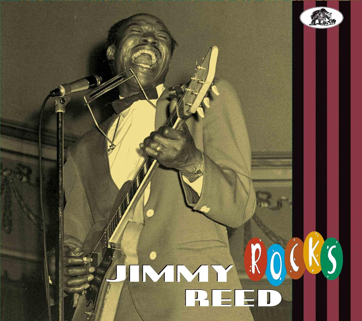 Jimmy Reed playing guitar, album cover for āRocksā CD.