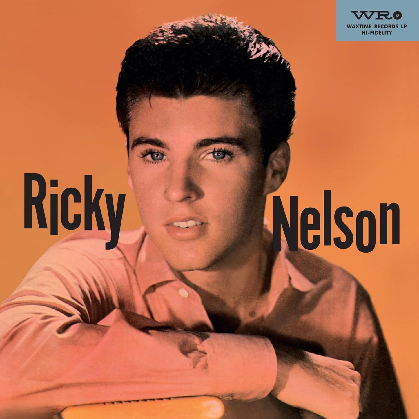 Portrait of Ricky Nelson against an orange background with his name in black text.