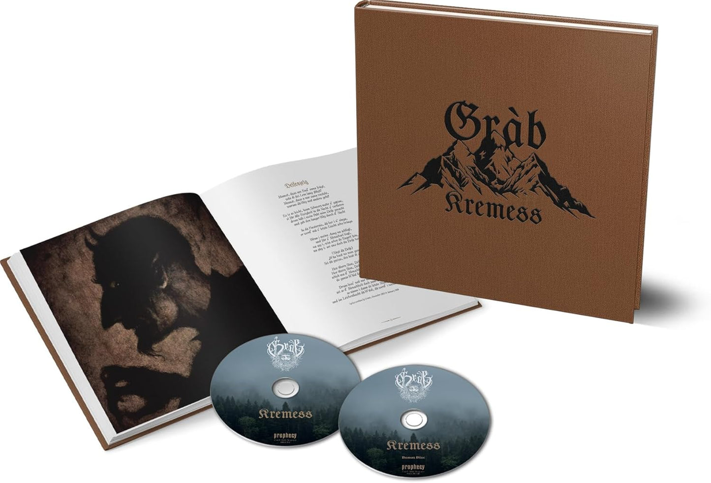 CD, hardcover book, and two discs with "Gràb - Kremess" artwork displayed.