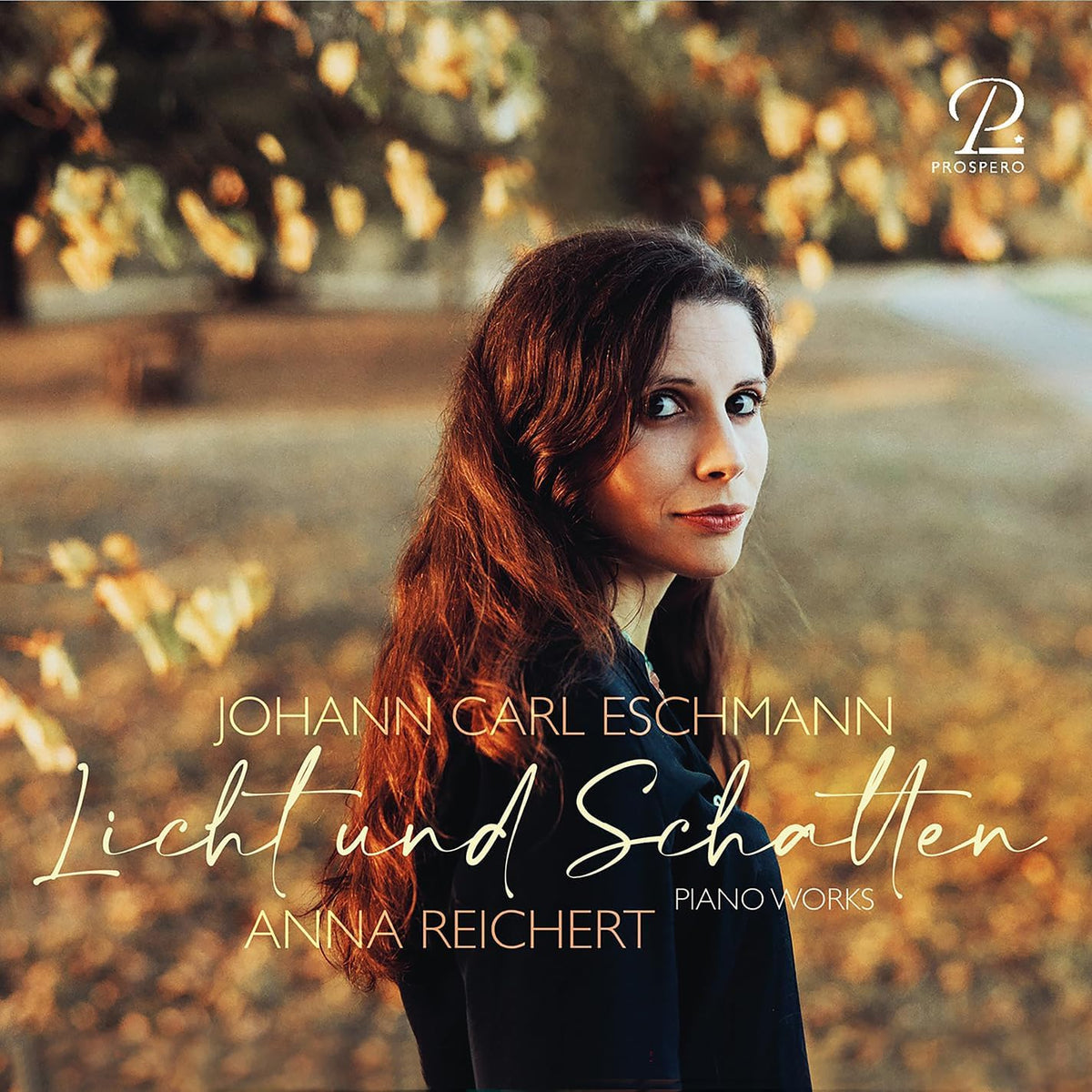 CD cover featuring Anna Reichert, pianist, with blurred foliage background.