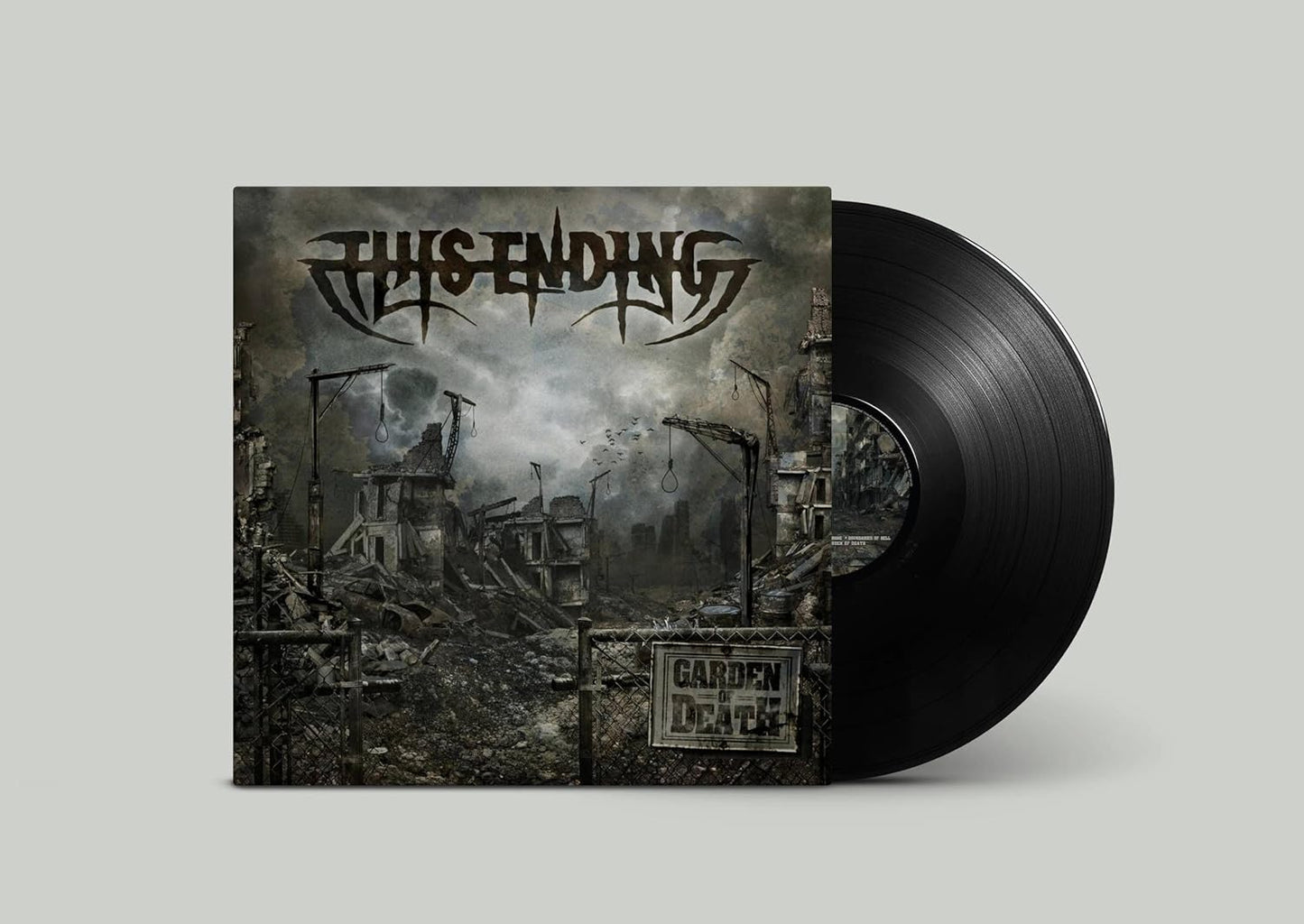 Vinyl record with album cover depicting a desolate, ruined cityscape.