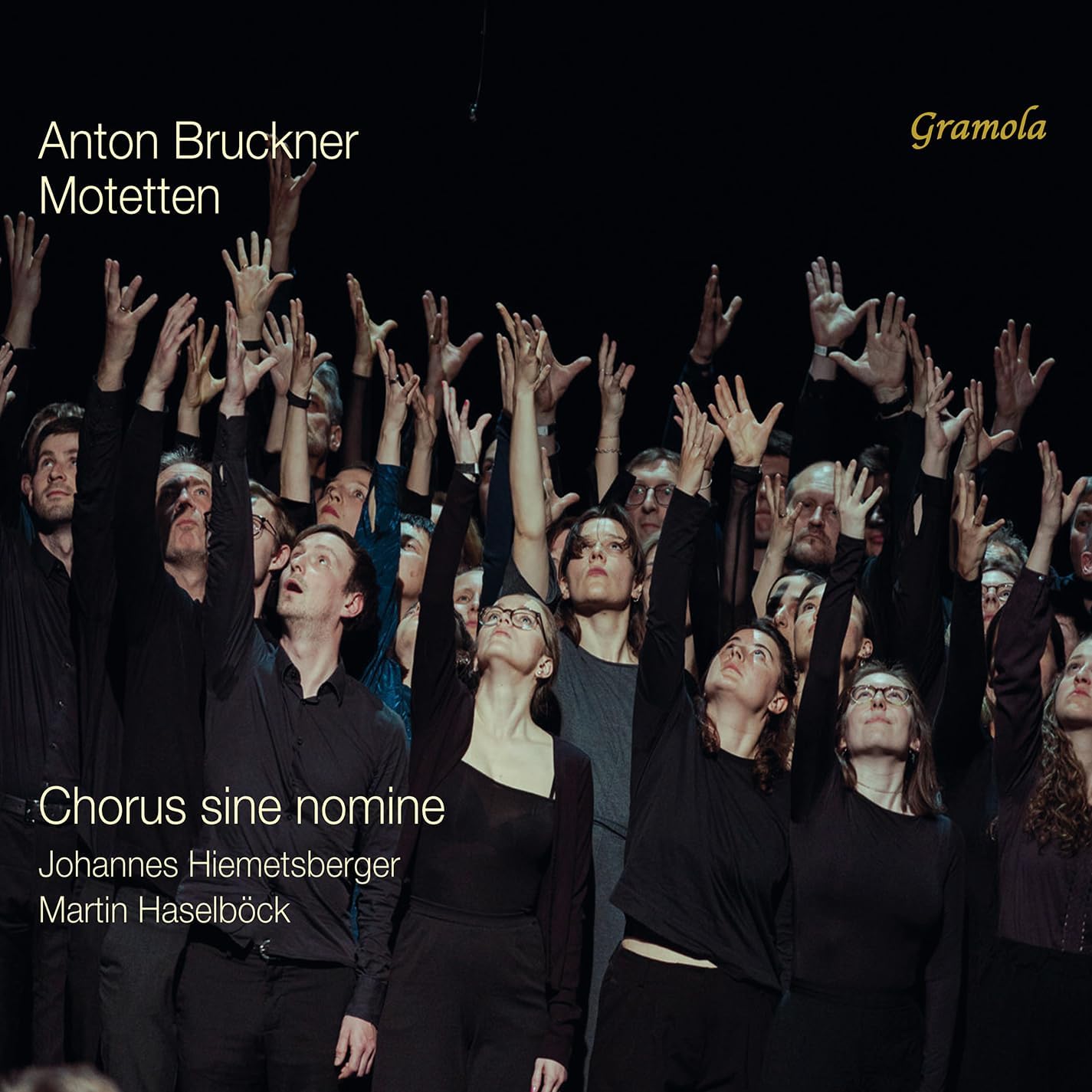 Choir members with arms raised, dark background, album cover for Bruckner's Motetten.