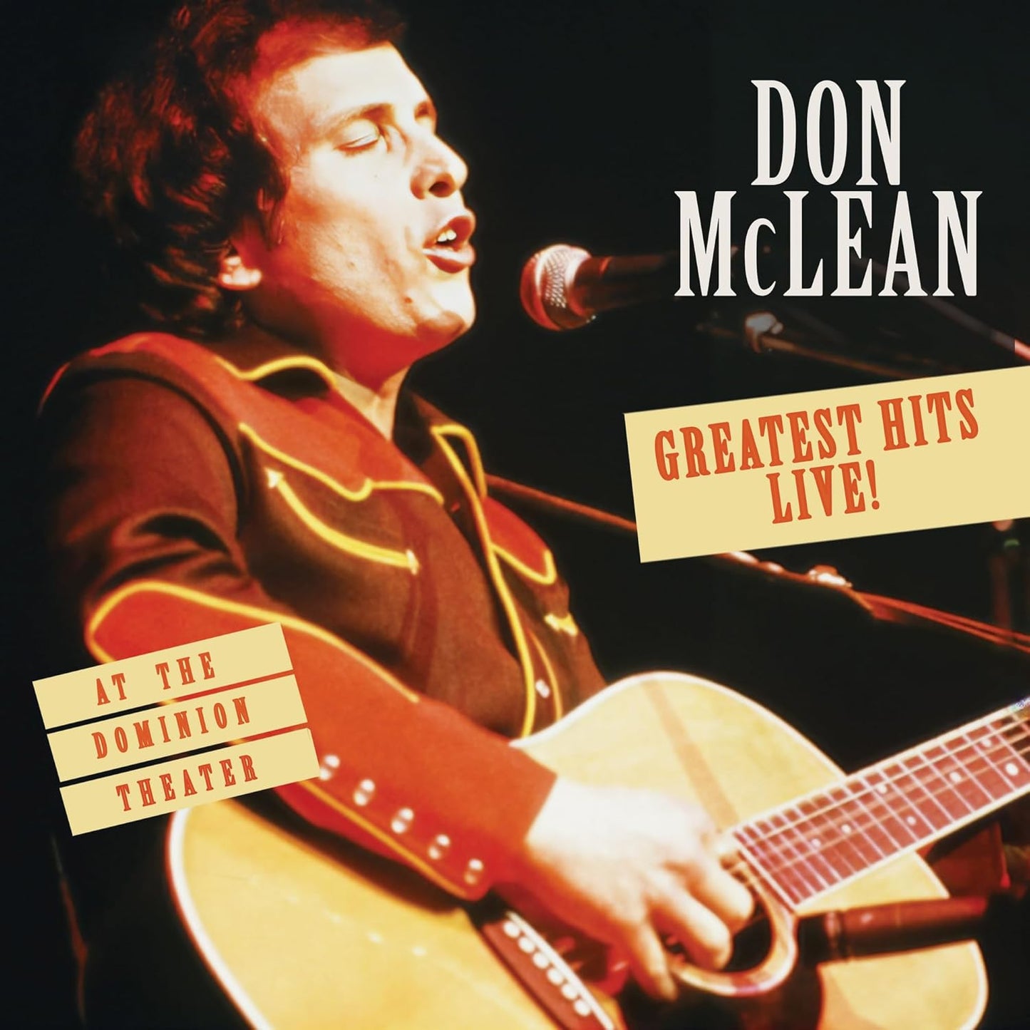 Don McLean playing guitar and singing into a microphone on album cover.