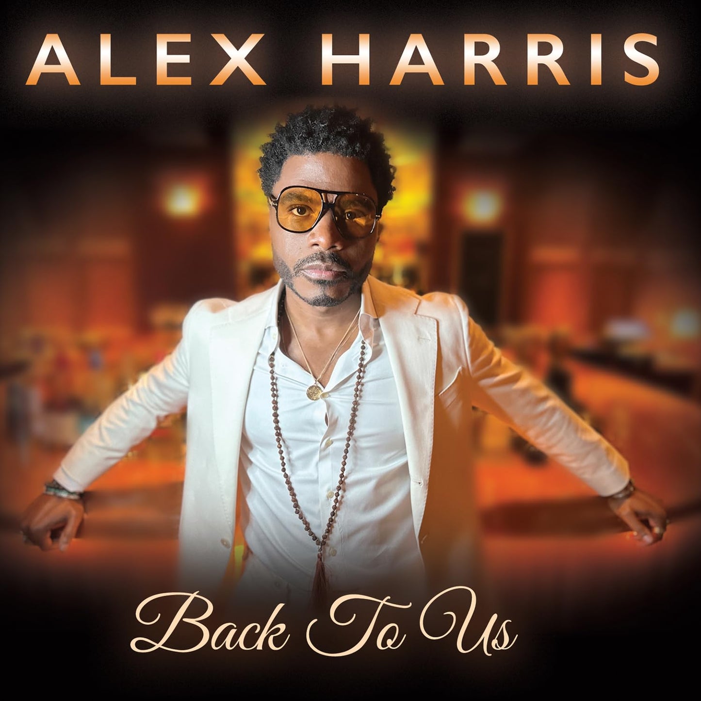 Alex Harris album cover, portrait of a man in a white jacket.