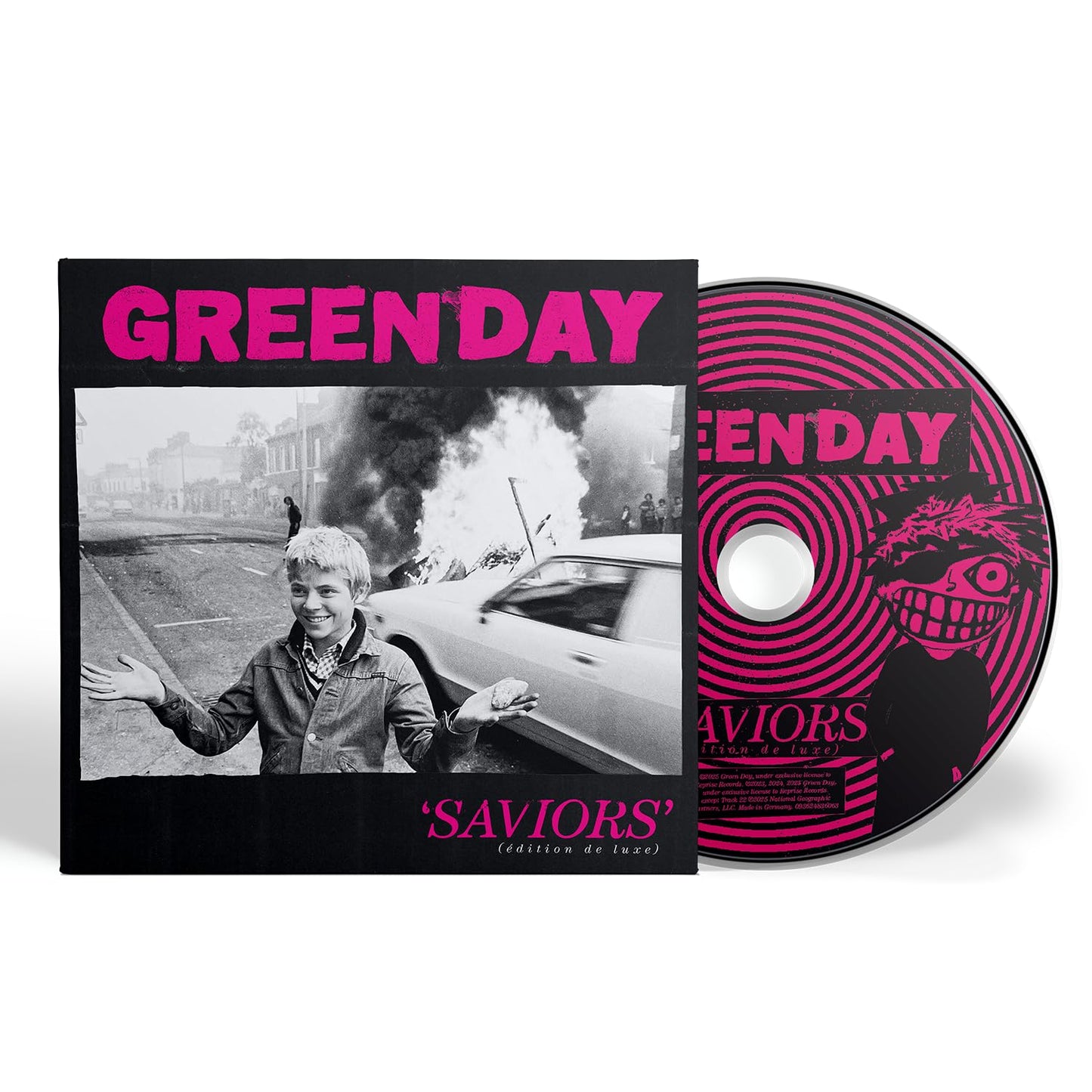 Green Day "Saviors" CD cover with a boy and car, plus the disc itself.