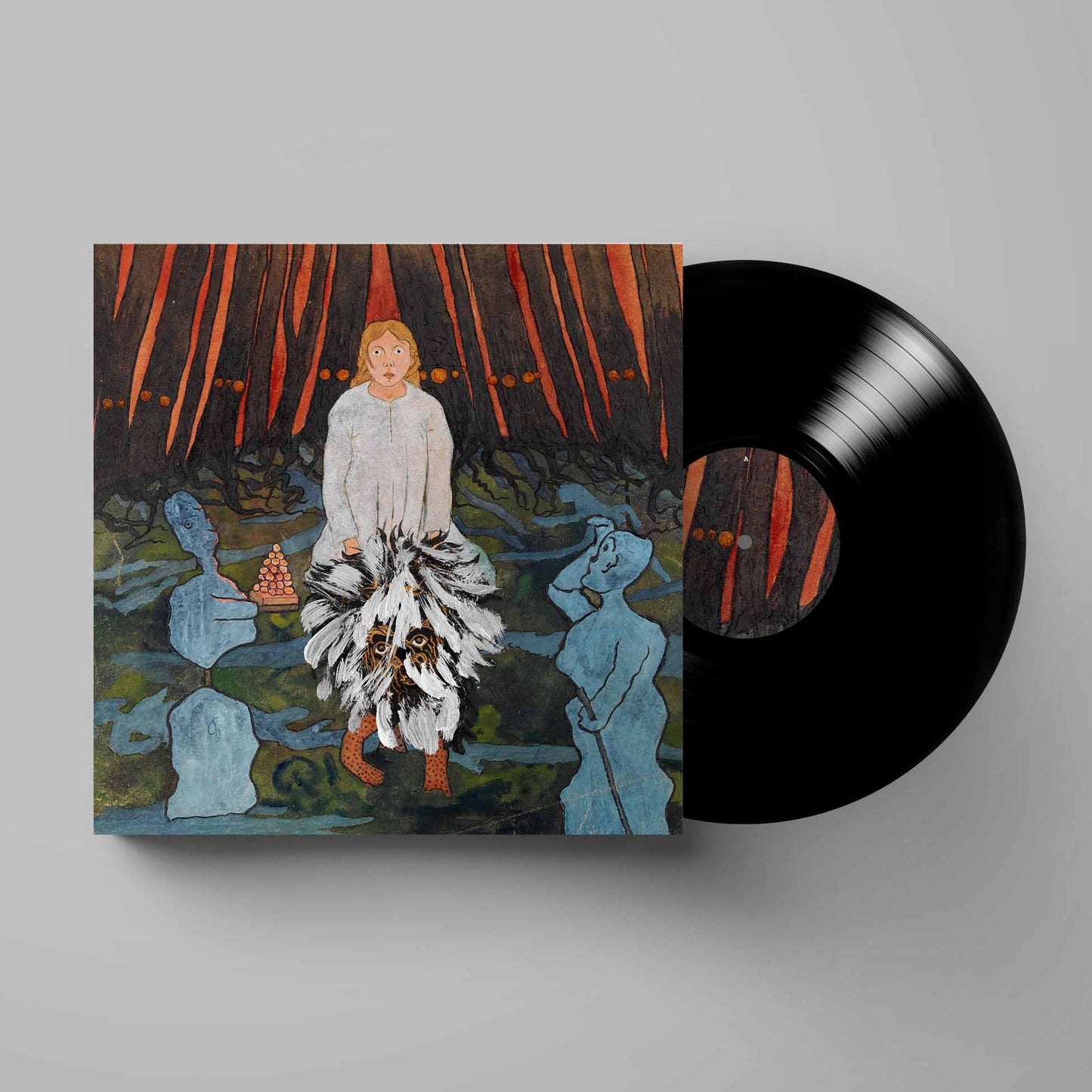Vinyl record with album art depicting a figure in a surreal garden.