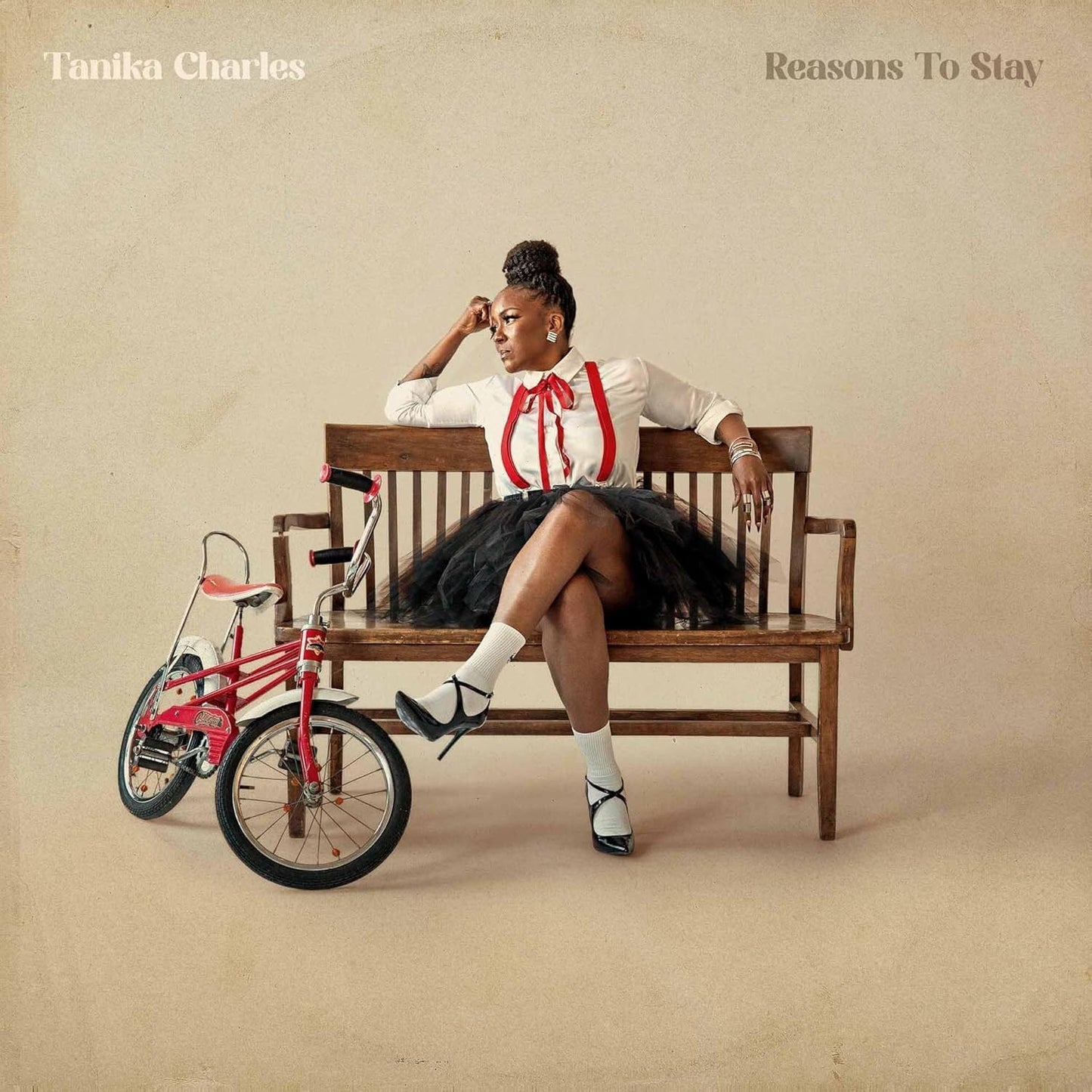 Transparent vinyl record of Charles & Tanika’s “Reasons To Stay,” with barcode.