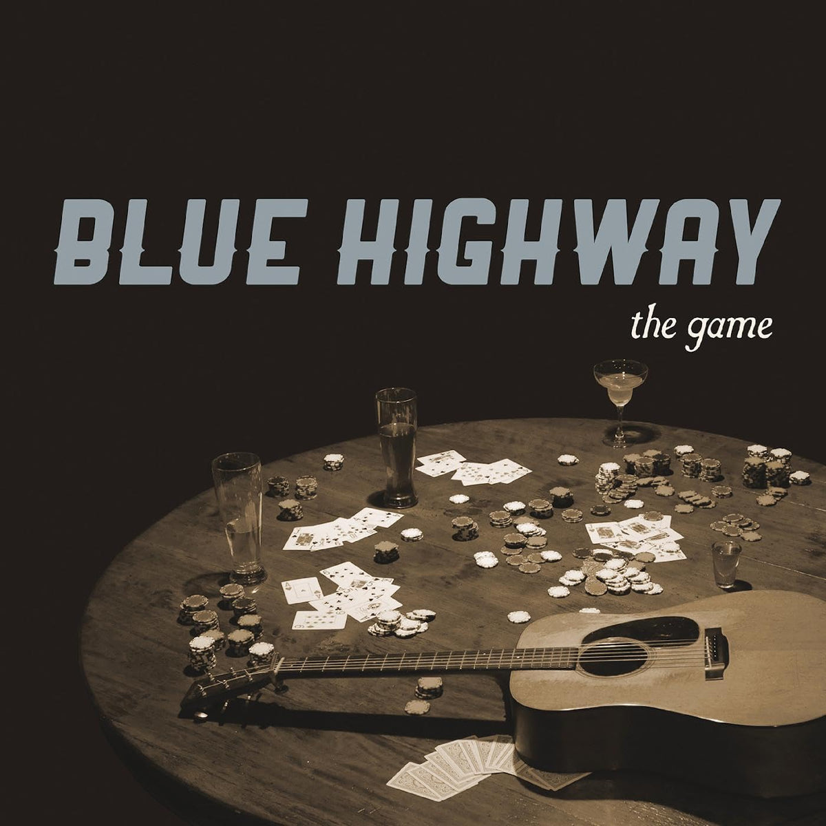 Blue Highway - The Game" CD cover with cards, chips, guitar, and drinks.