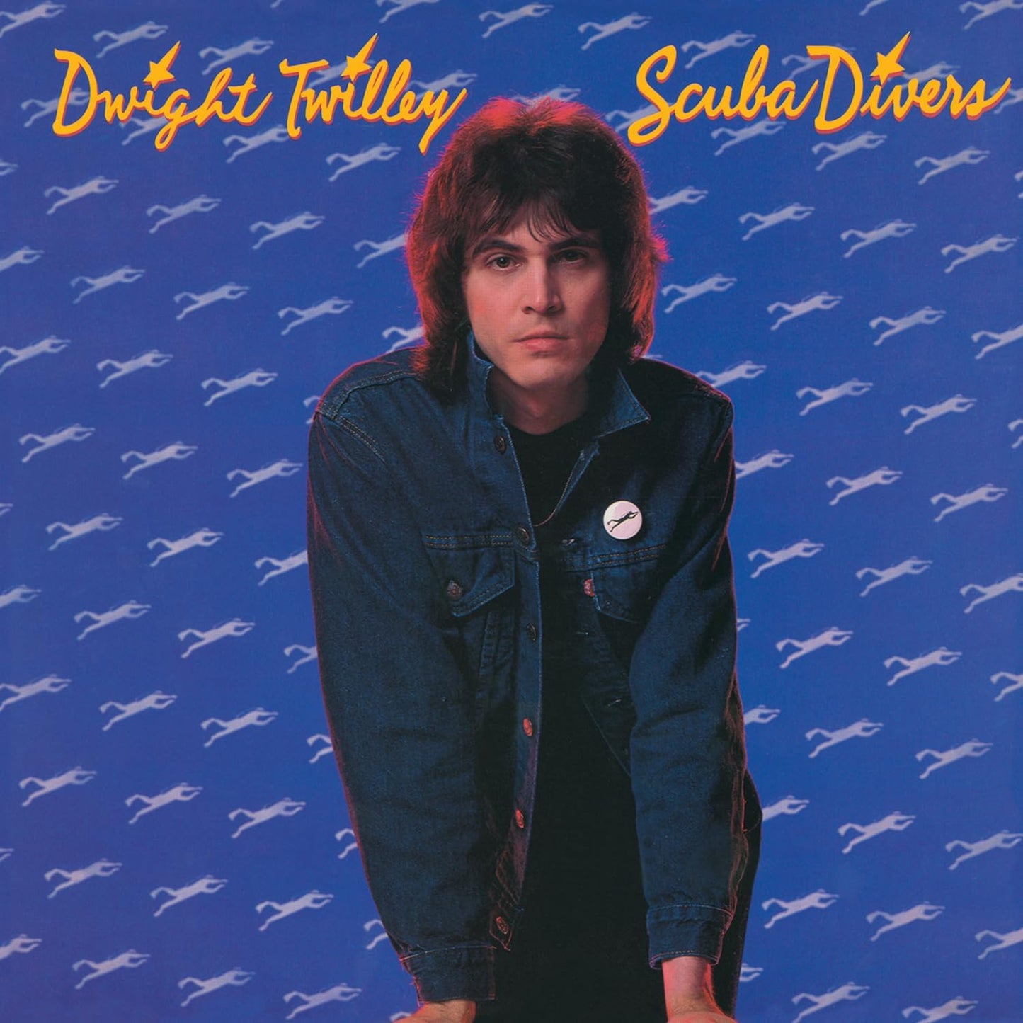Dwight Twilley album cover, portrait of a man with scuba diver silhouettes.