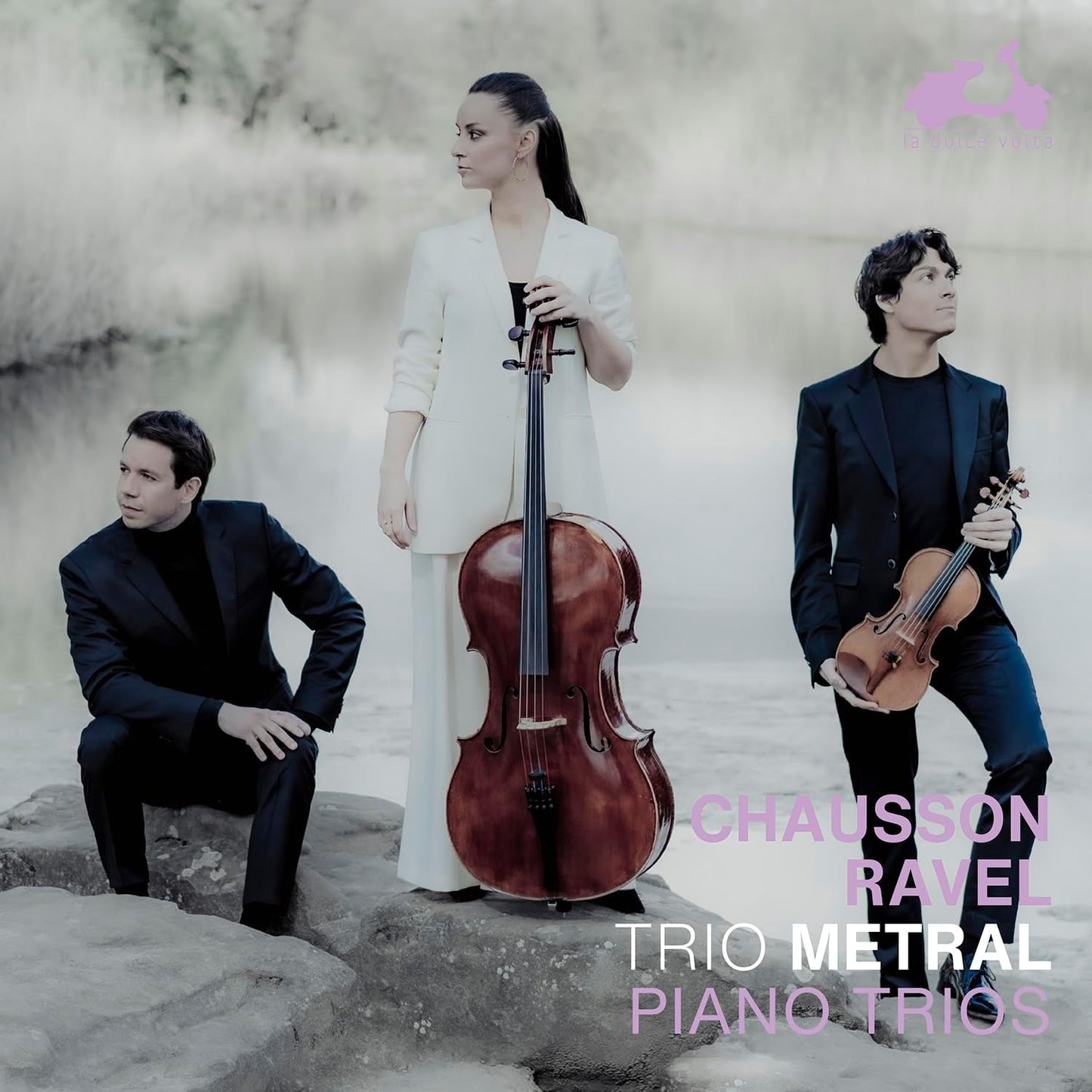 Classical musicians with cello, violin, and piano, album cover for Metral Trio.