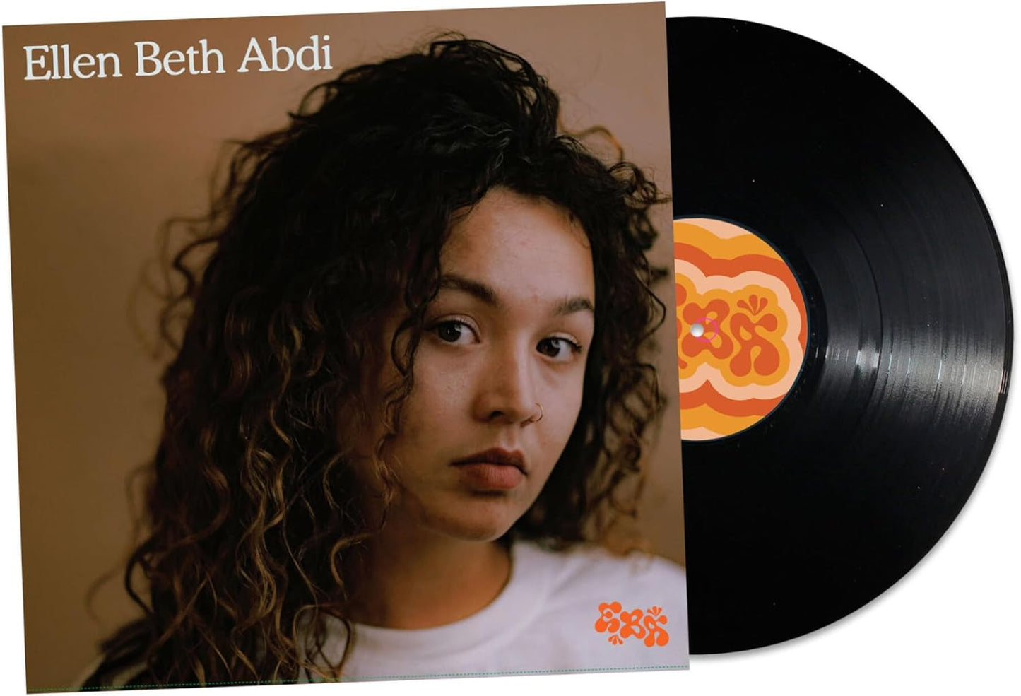 Vinyl record with portrait of a woman with curly hair.