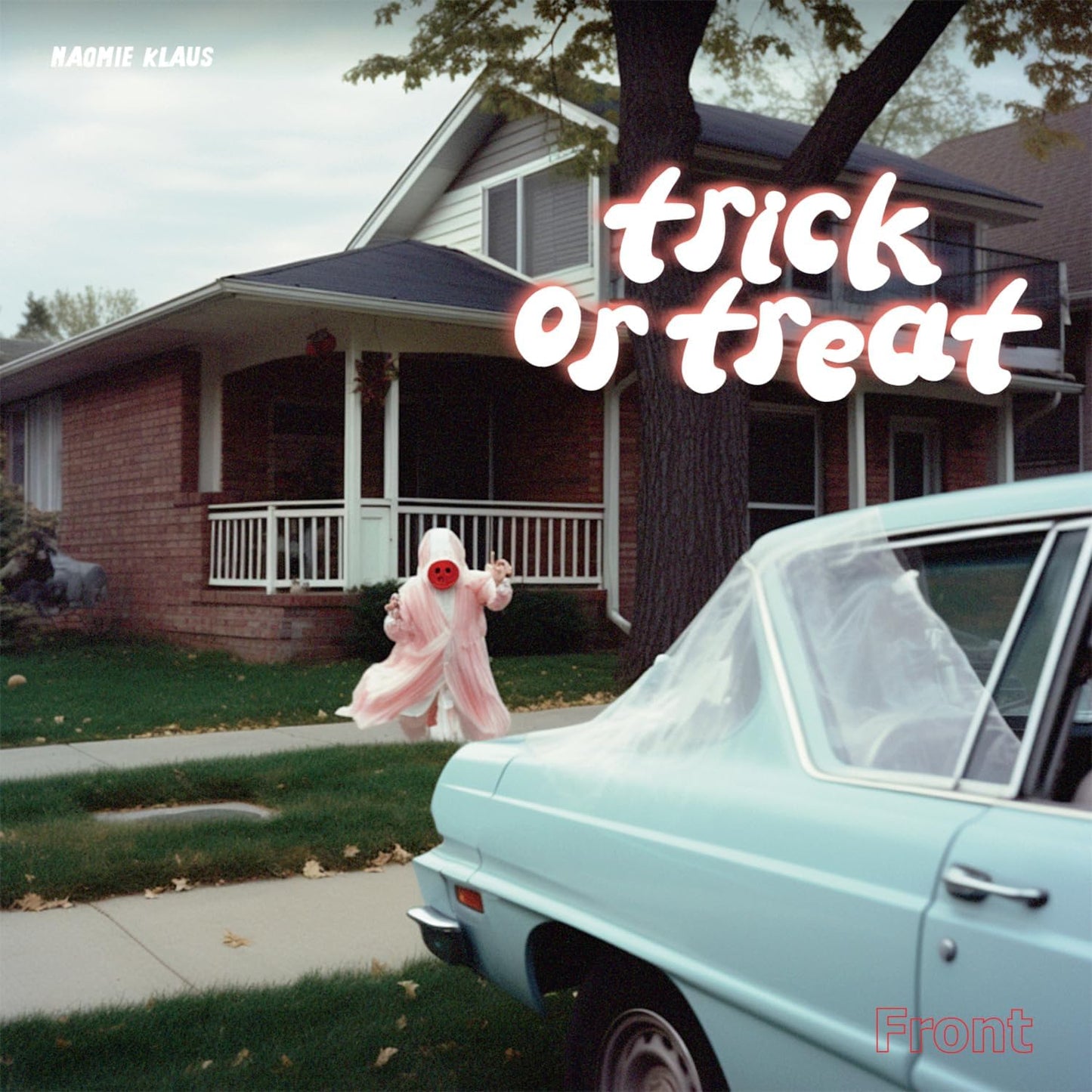Album cover with a costumed figure near a car and house.