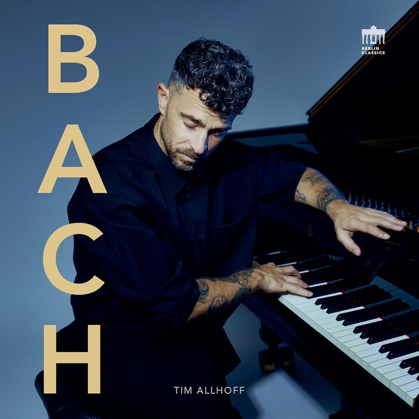 Tim Allhoff playing piano, album cover for Bach, dark blue background.