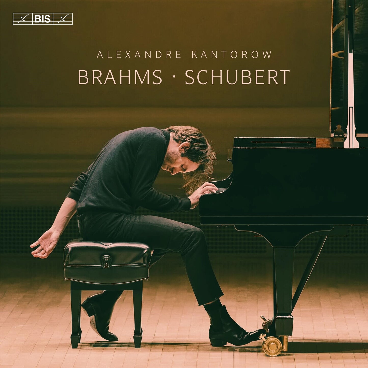 Pianist Alexandre Kantorow playing a black grand piano, album cover.