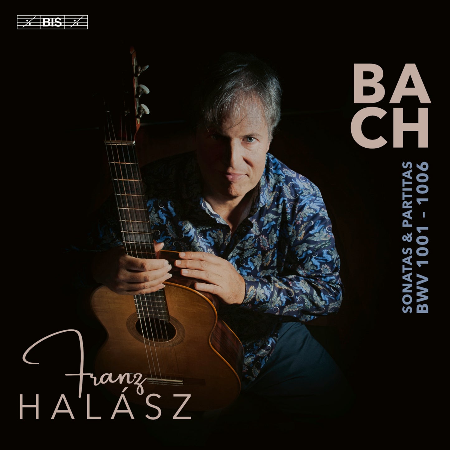 Franz Halasz portrait with a classical guitar, album cover for Bach sonatas.