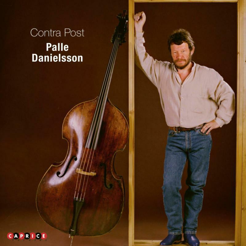 Album cover featuring a man and a large double bass, framed in a doorway.