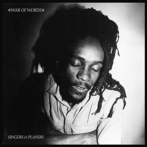 Vinyl cover of "Singers & Players - War Of Words" featuring abstract art and bold typography.