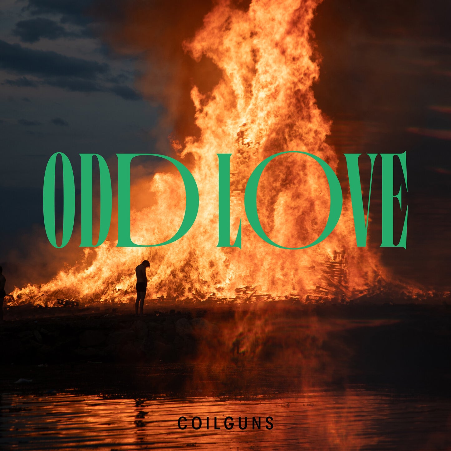 Vinyl album cover: burning bonfire with a lone figure, teal text.