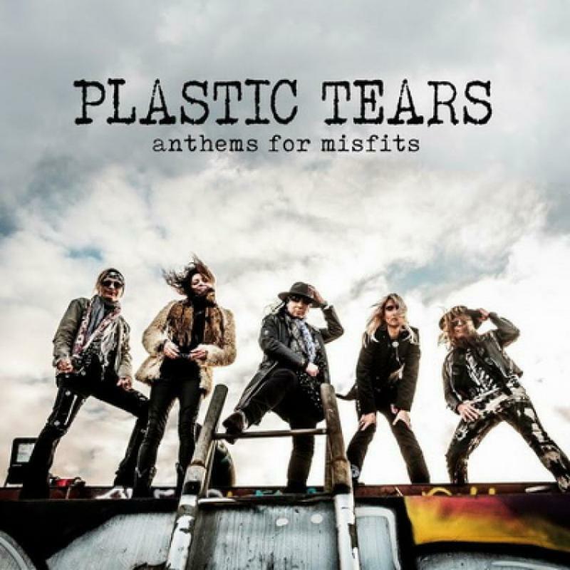 CD cover: Band Plastic Tears posing on a weathered vehicle.