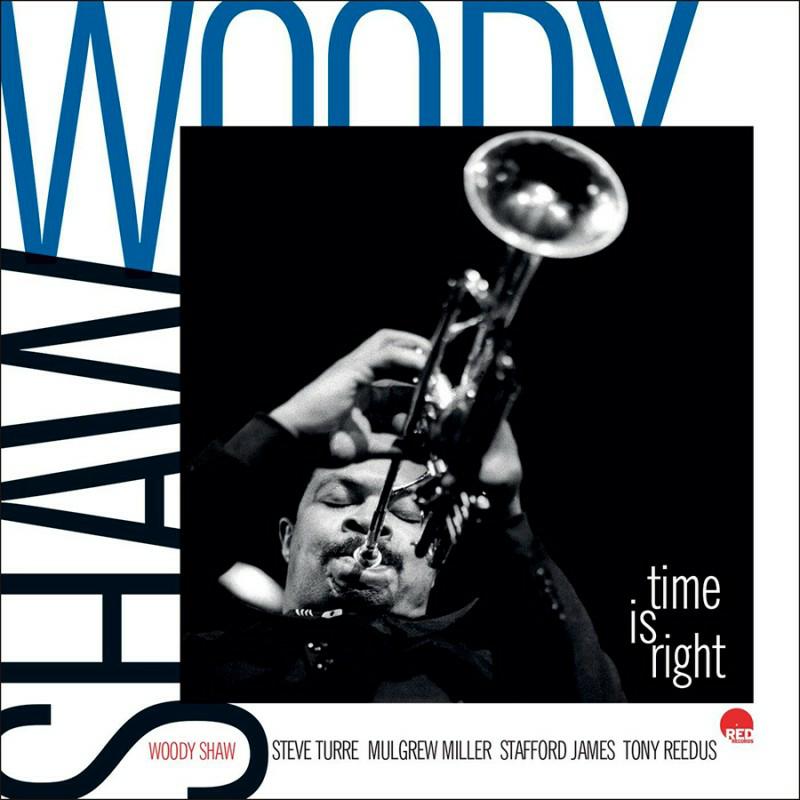 Woody Shaw playing trumpet on album cover, black and blue background.