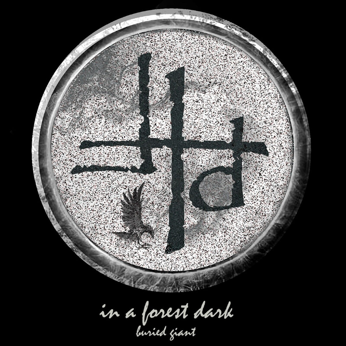 CD cover: circular design with black symbols and a raven.