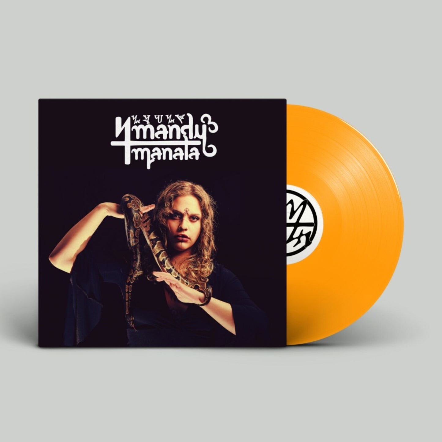 Vinyl record with a woman holding a snake on the cover.