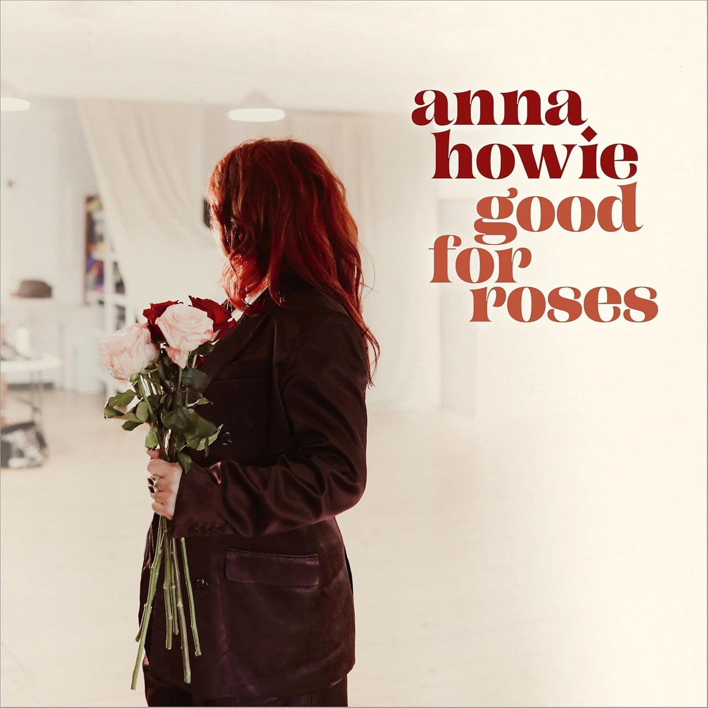 Album cover: Anna Howie, āGood for Rosesā, woman holding roses.
