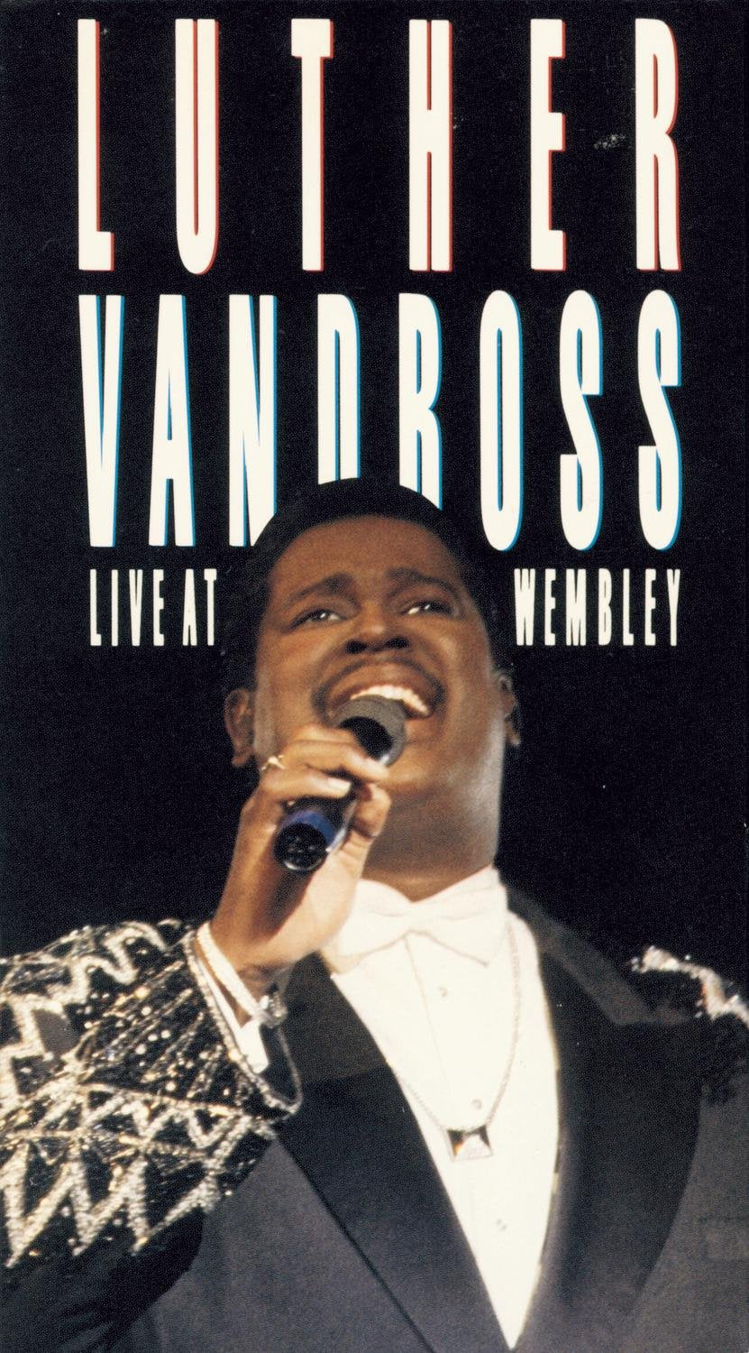 Luther Vandross singing into a microphone on the "Live At Wembley" DVD cover.