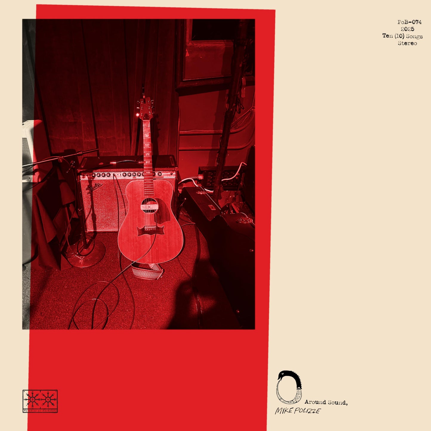Acoustic guitar and amplifier on a red carpet, album cover art.