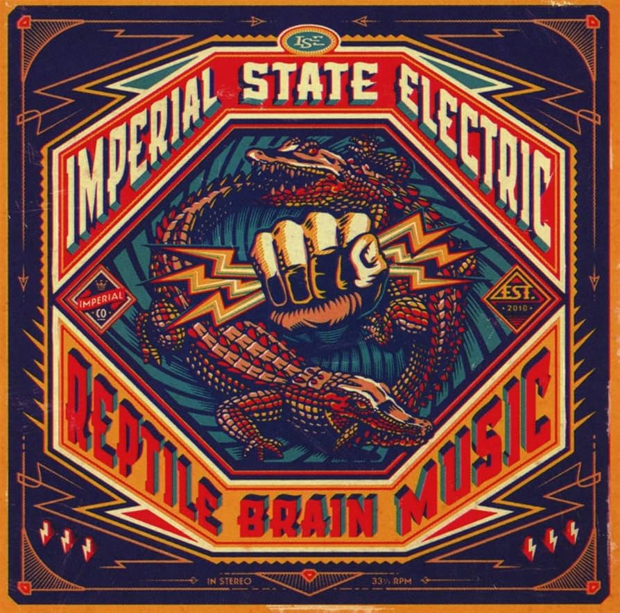Orange vinyl record of Imperial State Electric’s “Reptile Brain Music” album.