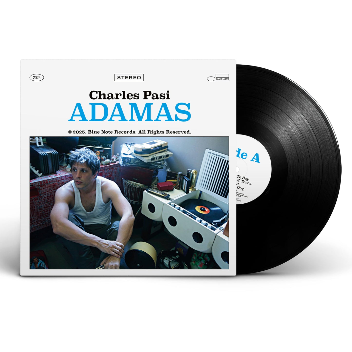 Charles Pasi "Adamas" vinyl record cover with portrait and studio scene.