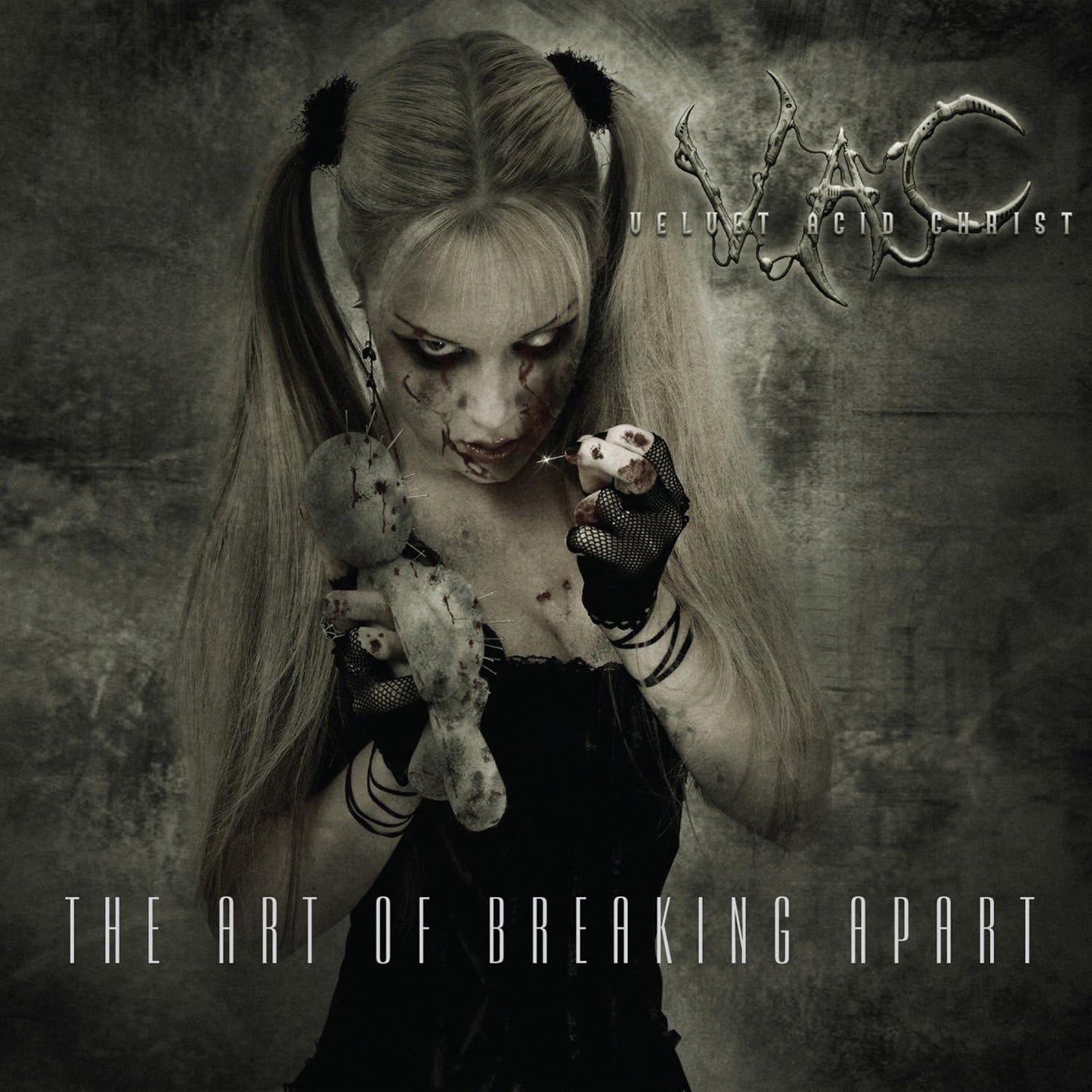Album cover: woman with doll, distressed appearance, dark and gritty aesthetic.