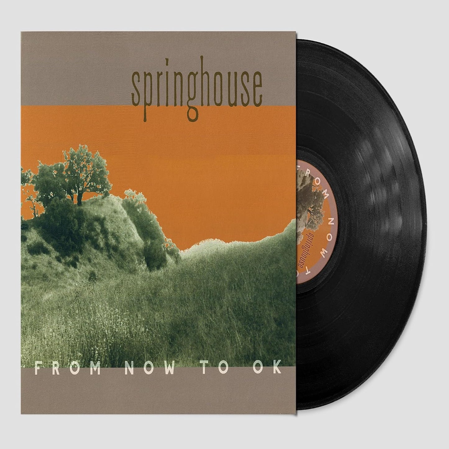 Vinyl record with orange and green landscape album cover, titled "springhouse".