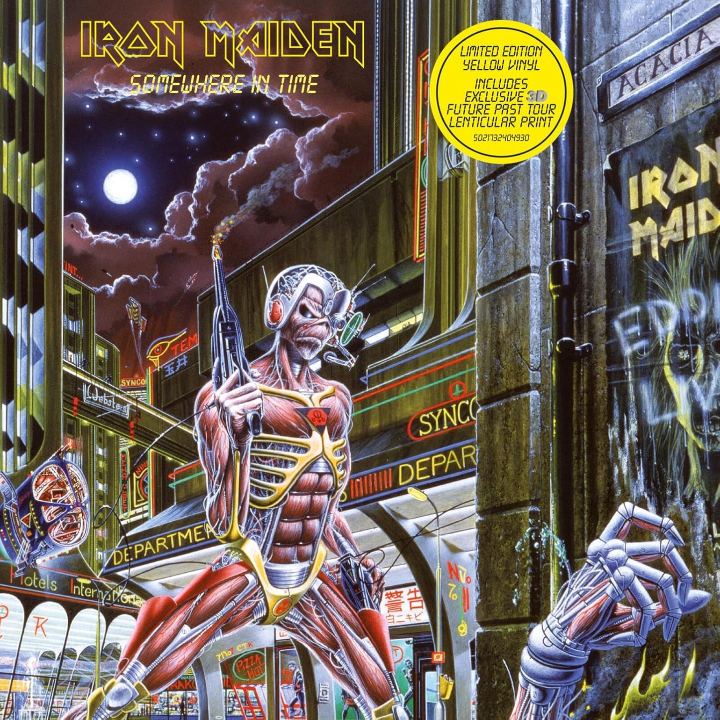 Iron Maiden Somewhere In Time vinyl record with yellow disc and illustrated album covers.