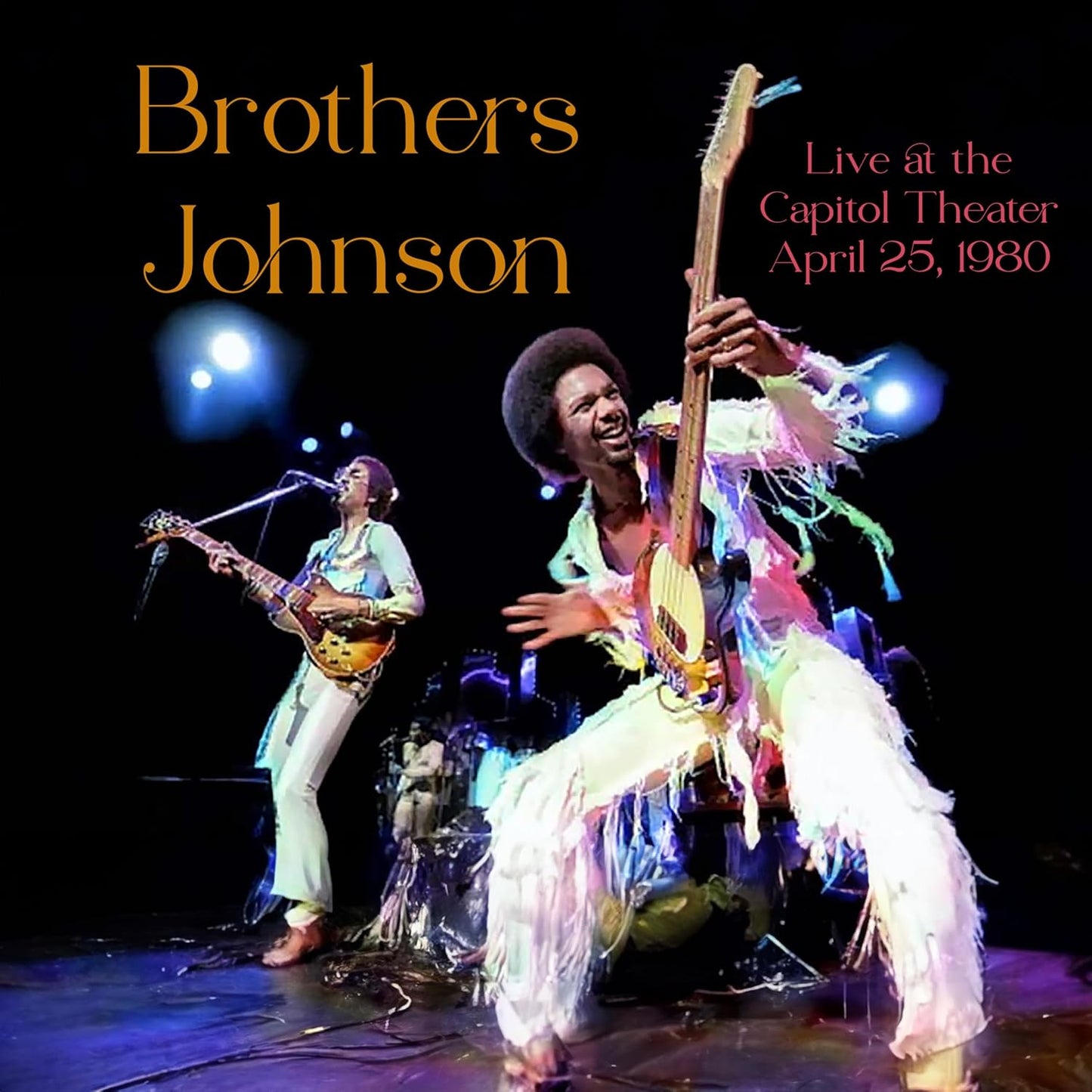 Brothers Johnson performing live on stage with guitars, 1980.